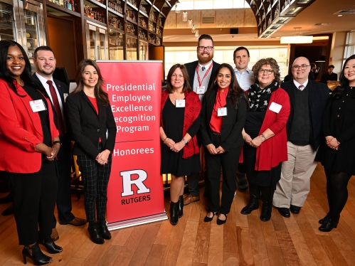 recipients of the Rutgers Employee Recognition Award pose together at the Rutgers Club